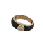 Bague en or jaune, résine noire et diamant