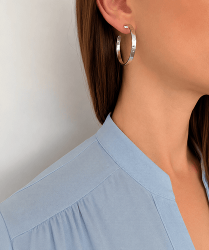 Boucles d'oreilles Cartier Love - Boucles d'oreilles créoles en or blanc 58 Facettes Boucles 01