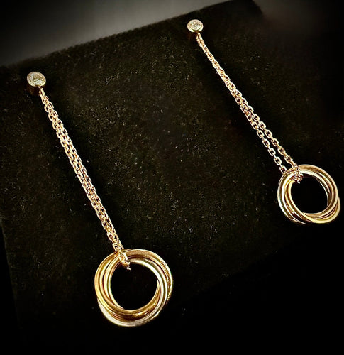 Boucles d'oreilles Cartier Trinity - Boucles d'oreilles 3 anneaux en trois ors et diamants 58 Facettes Boucles 03