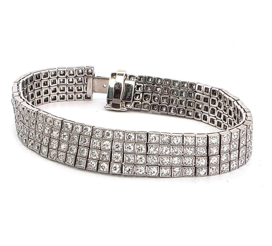 Bracelet S.J. Phillips Ltd. - Bracelet trois rangs en platine et diamants 58 Facettes 1570 B