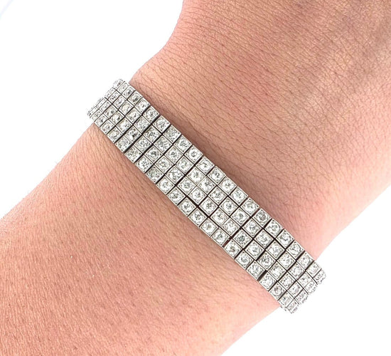 Bracelet S.J. Phillips Ltd. - Bracelet trois rangs en platine et diamants 58 Facettes 1570 B