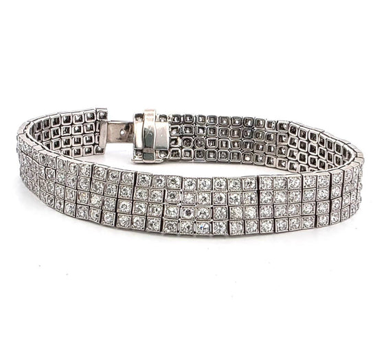 Bracelet S.J. Phillips Ltd. - Bracelet trois rangs en platine et diamants 58 Facettes 1570 B