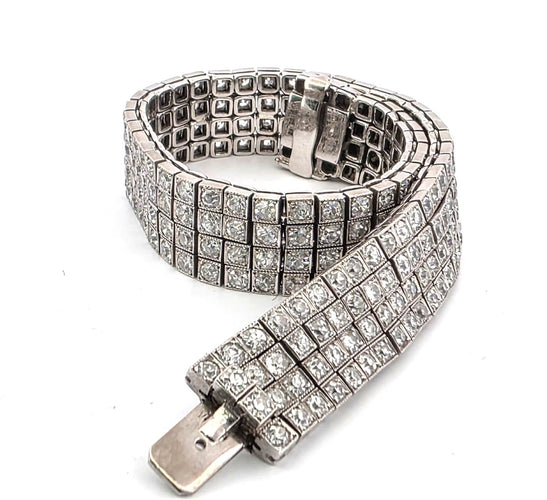 Bracelet S.J. Phillips Ltd. - Bracelet trois rangs en platine et diamants 58 Facettes 1570 B