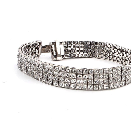 Bracelet S.J. Phillips Ltd. - Bracelet trois rangs en platine et diamants 58 Facettes 1570 B