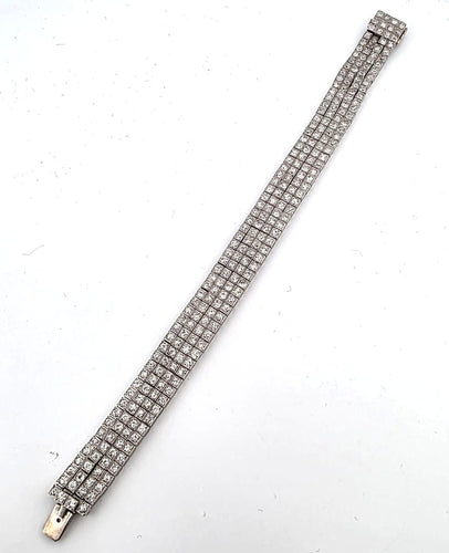 Bracelet S.J. Phillips Ltd. - Bracelet trois rangs en platine et diamants 58 Facettes 1570 B