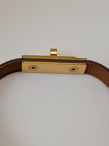 Bracelet Hermès Kelly Mini - Bracelet en plaqué or et cuir 58 Facettes 1220