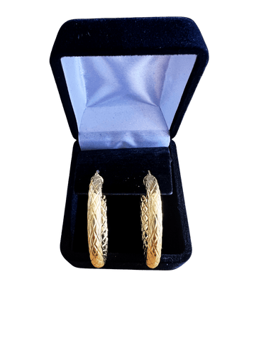 Boucles d'oreilles Boucles d'oreilles créoles texturées en or jaune 18 carats 58 Facettes N54