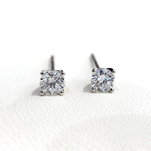 Bague Embrace - Boucles d'oreilles solitaire 0,60 ct en or blanc et diamants 58 Facettes GER1006WG