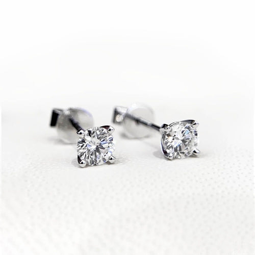 Bague Embrace - Boucles d'oreilles solitaire 0,60 ct en or blanc et diamants 58 Facettes GER1006WG