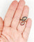 Bague 52.5 Bague marquise moderniste en or 18k, diamants, rubis et saphirs 58 Facettes A07270
