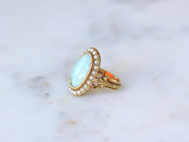 Bague 50 Bague ancienne en or jaune, opale australienne et perles fines 58 Facettes