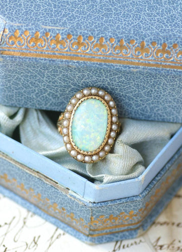 Bague 50 Bague ancienne en or jaune, opale australienne et perles fines 58 Facettes