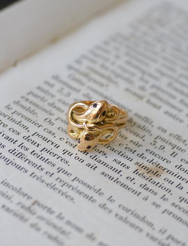 Bague 53 Bague ancienne serpents enroulés en deux ors et rubis 58 Facettes
