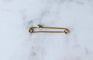 Broche Broche épingle à nourrice en or jaune et saphir de Ceylan 58 Facettes