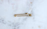 Broche Broche épingle à nourrice en or jaune et saphir de Ceylan 58 Facettes