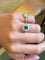 Bague 58 Bague entourage en or jaune, émeraude et diamants 58 Facettes 200