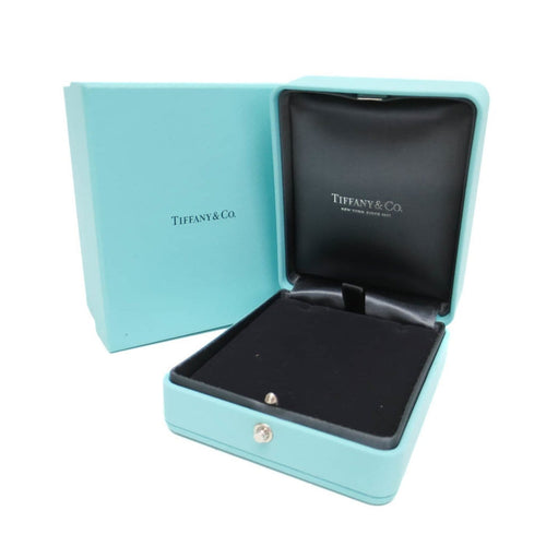 Collier Tiffany & Co. - Collier pendentif Letter Disc en or jaune 18K 58 Facettes tvg2iyp7ie