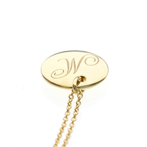Collier Tiffany & Co. - Collier pendentif Letter Disc en or jaune 18K 58 Facettes tvg2iyp7ie