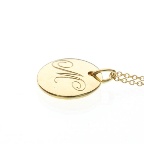 Collier Tiffany & Co. - Collier pendentif Letter Disc en or jaune 18K 58 Facettes tvg2iyp7ie