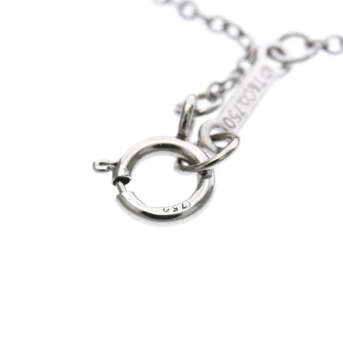 Collier Tiffany & Co. Étoile - Collier pendentif croix en or blanc et diamants 58 Facettes rp76x1hkwr