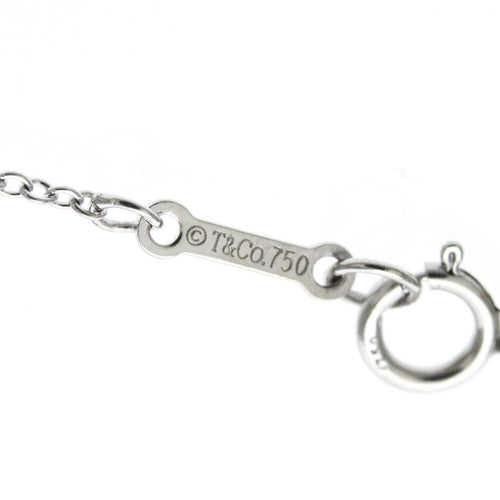 Collier Tiffany & Co. Étoile - Collier pendentif croix en or blanc et diamants 58 Facettes rp76x1hkwr