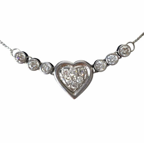 Collier Collier cœur en or blanc 18K et diamants 58 Facettes 269