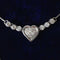 Collier Collier cœur en or blanc 18K et diamants 58 Facettes 269