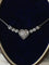 Collier Collier cœur en or blanc 18K et diamants 58 Facettes 269