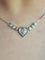 Collier Collier cœur en or blanc 18K et diamants 58 Facettes 269