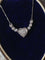Collier Collier cœur en or blanc 18K et diamants 58 Facettes 269