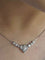 Collier Collier cœur en or blanc 18K et diamants 58 Facettes 269