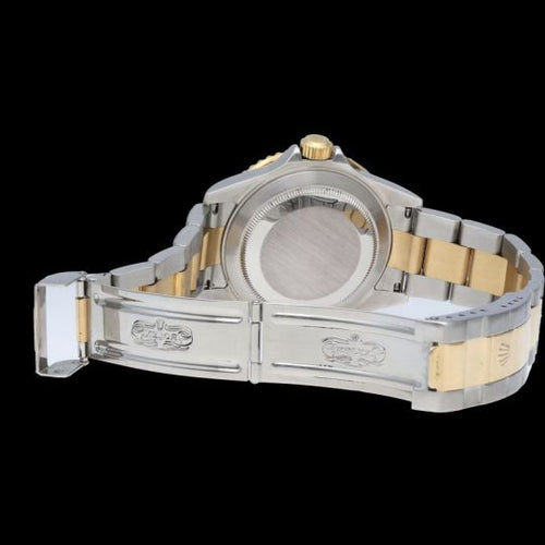 Montre Rolex Submariner Date - Montre en or jaune et acier 58 Facettes MT46875