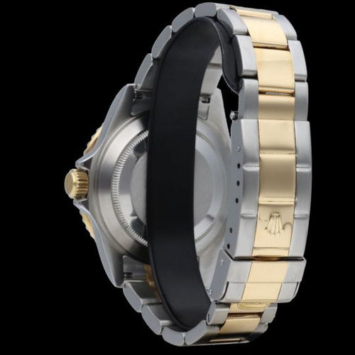 Montre Rolex Submariner Date - Montre en or jaune et acier 58 Facettes MT46875