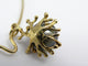 Collier Collier pendentif motif corail en or jaune 18K et perle grise 58 Facettes 273059