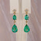 Boucles d'oreilles Boucles d'oreilles pendantes en or jaune 14 ct, émeraudes et diamants 58 Facettes E015
