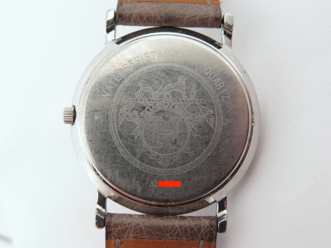 Montre Hermès Sellier - Montre 32 mm en acier et cuir autruche 58 Facettes 275124