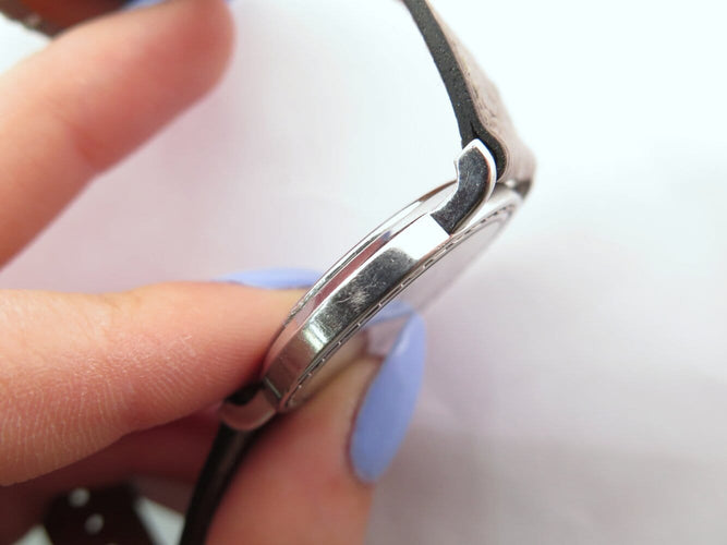 Montre Hermès Sellier - Montre 32 mm en acier et cuir autruche 58 Facettes 275124