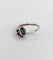 Bague 51.5 Bague cible Art déco en or blanc, platine, diamant et rubis synthétiques 58 Facettes A07317