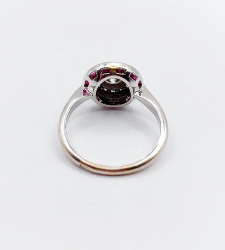 Bague 51.5 Bague cible Art déco en or blanc, platine, diamant et rubis synthétiques 58 Facettes A07317