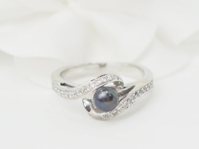 Bague 60 Bague en or blanc, perle de Tahiti et diamants 58 Facettes 26570