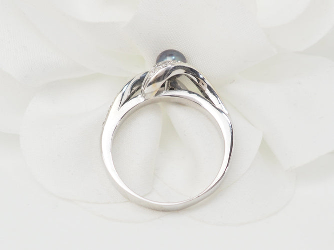 Bague 60 Bague en or blanc, perle de Tahiti et diamants 58 Facettes 26570