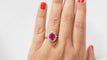 Bague Bague marguerite en or blanc, rubis et diamants 58 Facettes 4833