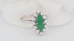Bague 53 Bague marquise en or blanc, émeraude et diamants 58 Facettes 33052