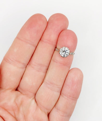 Bague 47 Bague solitaire Art déco en or blanc, platine et diamants 58 Facettes A07288