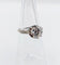 Bague 47 Bague solitaire Art déco en or blanc, platine et diamants 58 Facettes A07288