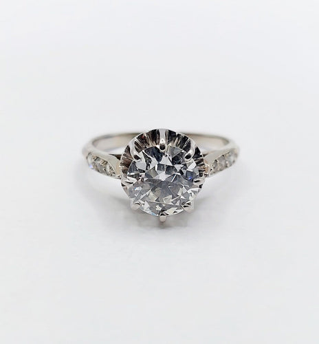 Bague 47 Bague solitaire Art déco en or blanc, platine et diamants 58 Facettes A07288