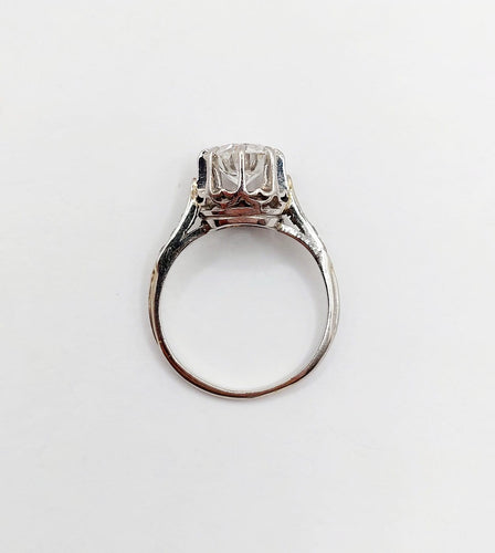 Bague 47 Bague solitaire Art déco en or blanc, platine et diamants 58 Facettes A07288