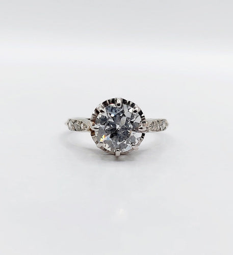 Bague 47 Bague solitaire Art déco en or blanc, platine et diamants 58 Facettes A07288
