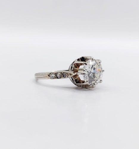 Bague 47 Bague solitaire Art déco en or blanc, platine et diamants 58 Facettes A07288