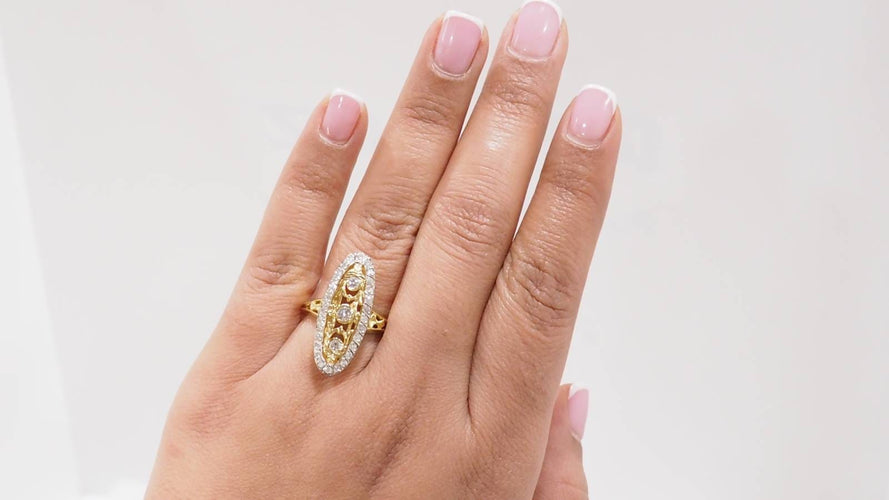 Bague 59.5 Bague marquise en or bicolore 18 kt et diamants 58 Facettes 33010